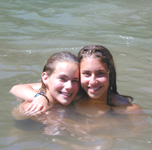 Two girls smiling in the lake