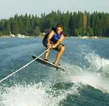 Teenager water skiing on the lake